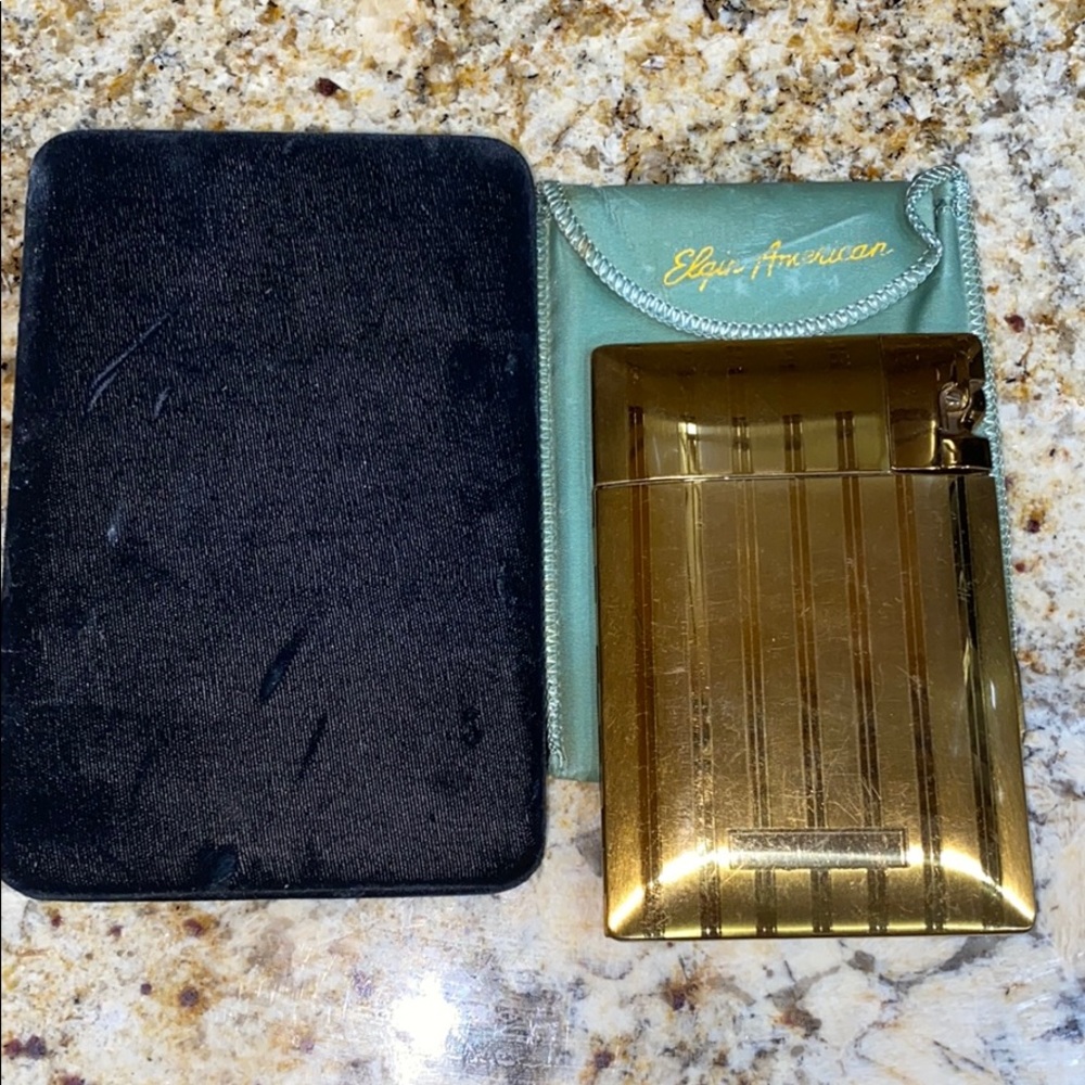Vintage Elgin American cigarette holder and lighte